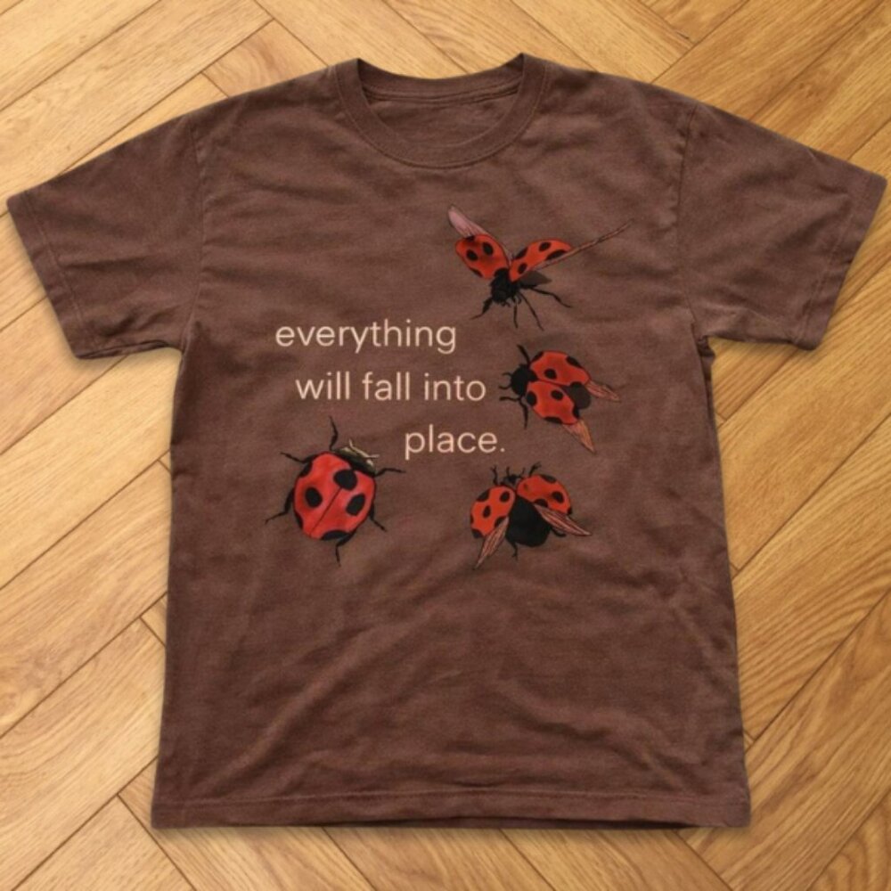 Brown - Red Ladybug Quote "everything will fall into place" Graphic T-Shirt